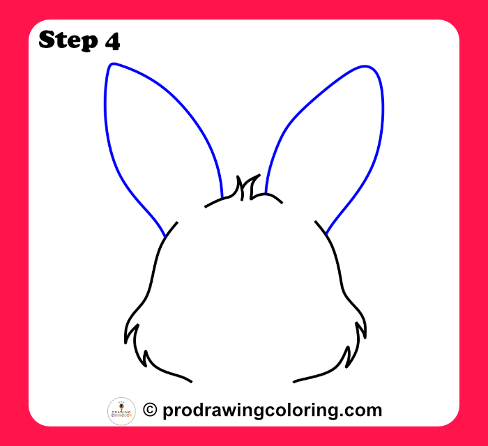 Drawing bunny ears by adding two tall oval shapes to the head.