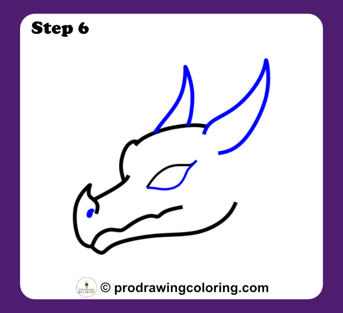 Dragon horns and eye base drawn in a step by step dragon tutorial.